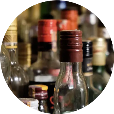 https://bartesian.com/cdn/shop/files/the_tops_of_liquor_bottles.webp?v=1680806593&width=500